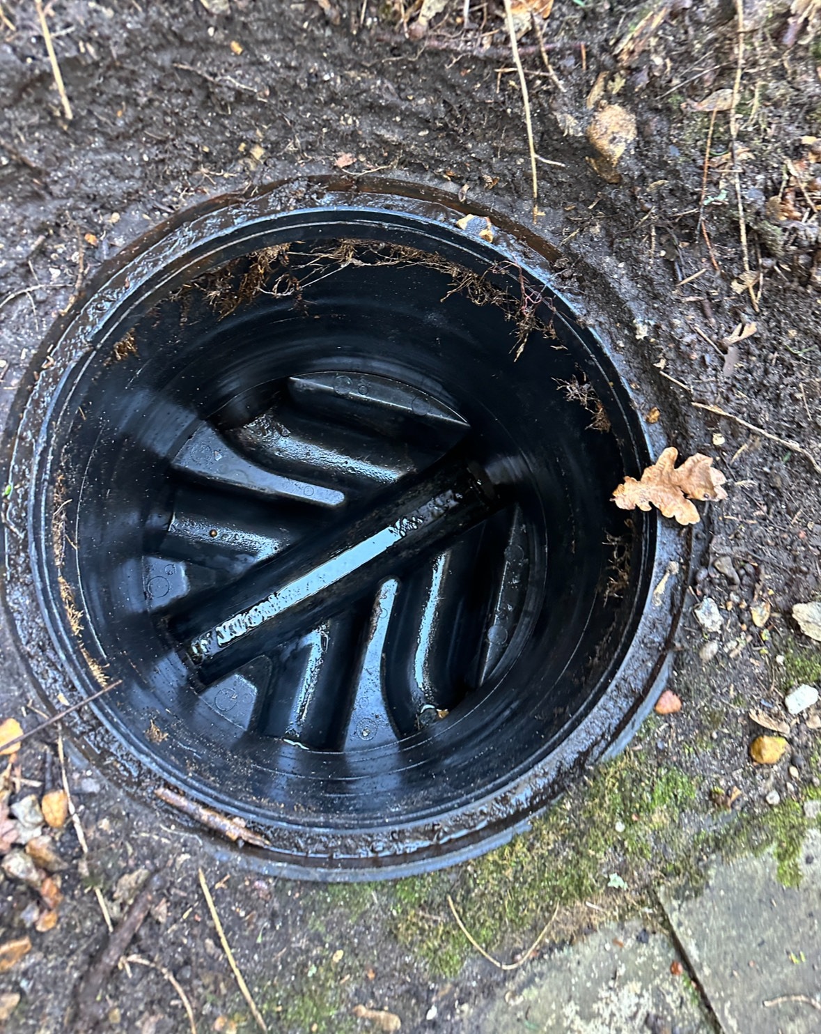 Clean drain grate after professional jetting service